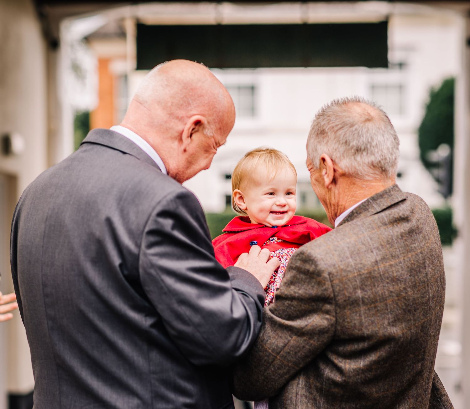 two grandads with grandchild at Wimborne wedding venue, Registry office. Documentary candid  Wedding Photographer, Dorset Somerset, Devon