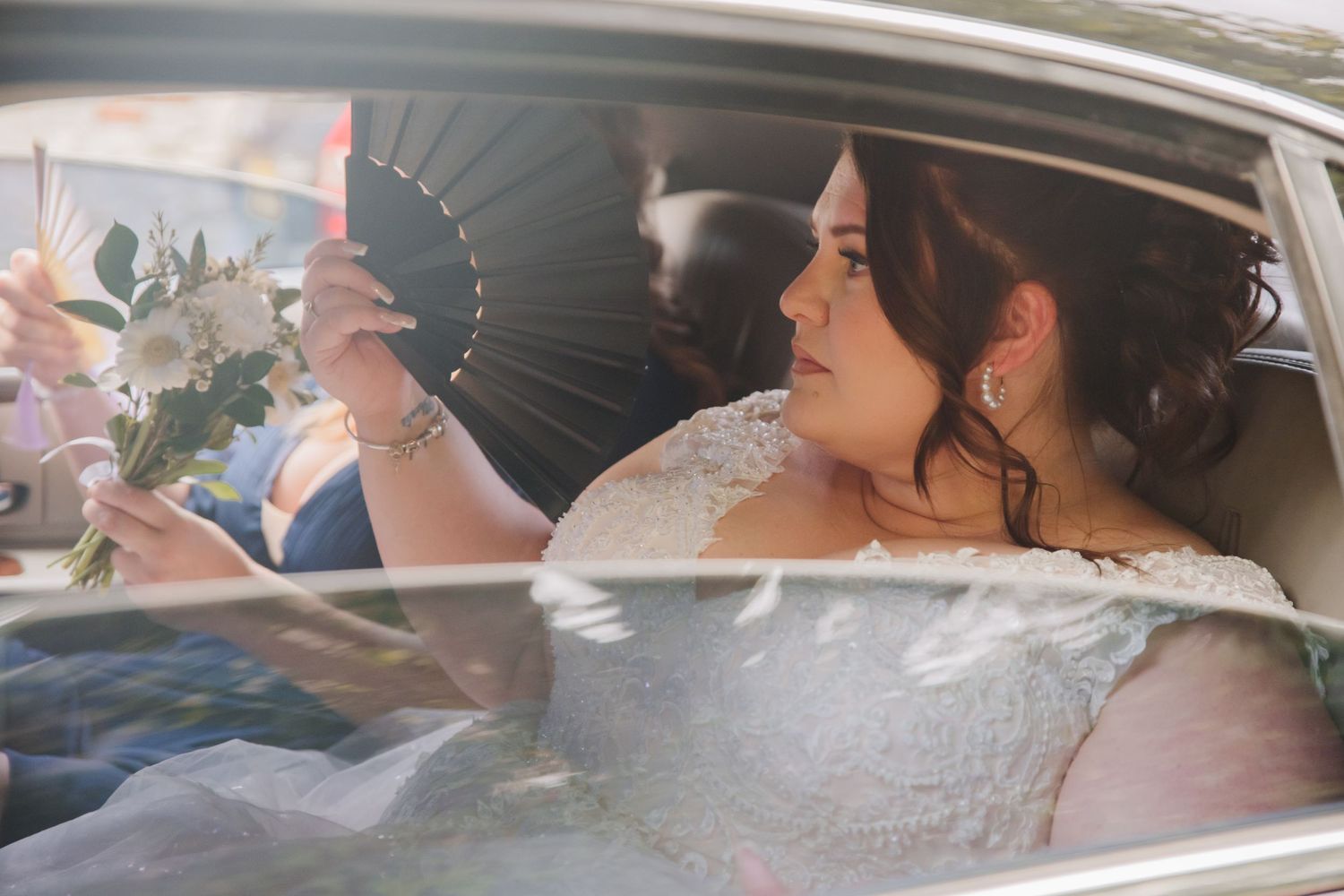 Bride arrives by car at a Dorchester Church wedding. Dorset Wedding photographer. Dorchester wedding. Weymouth wedding photographer