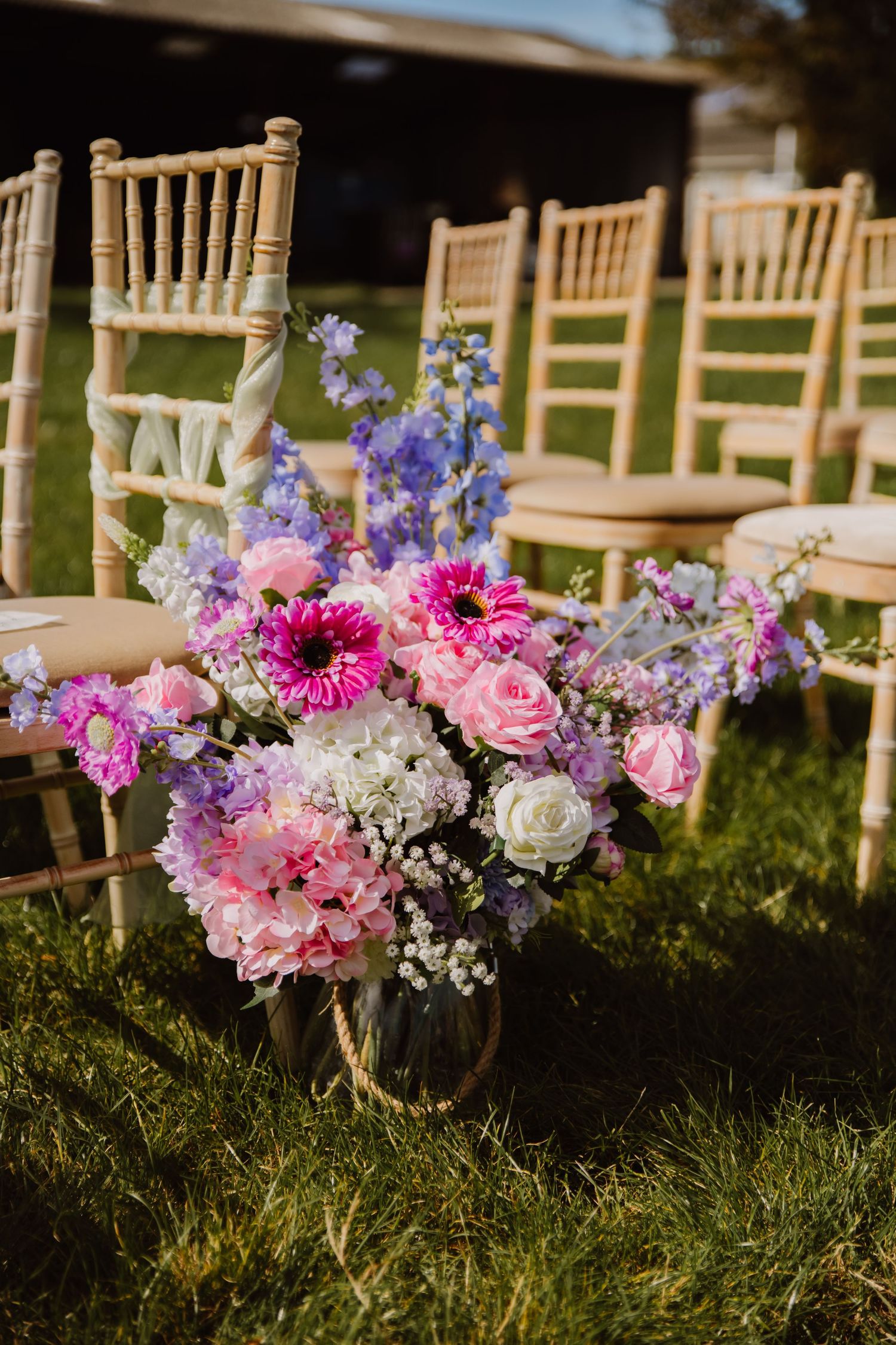 Outdoor wedding venue with barn near Weymouth, Dorchester Dorset. Bright pink and purple flowers. Wedding flowers Dorset. Weymouth flows