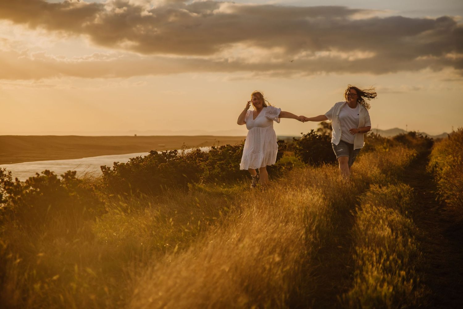 chesil beach engagement shoot. Wedding photographer Weymouth. Dorset photographer. Dorset candid wedding photographer. Natural photos LGBTQ