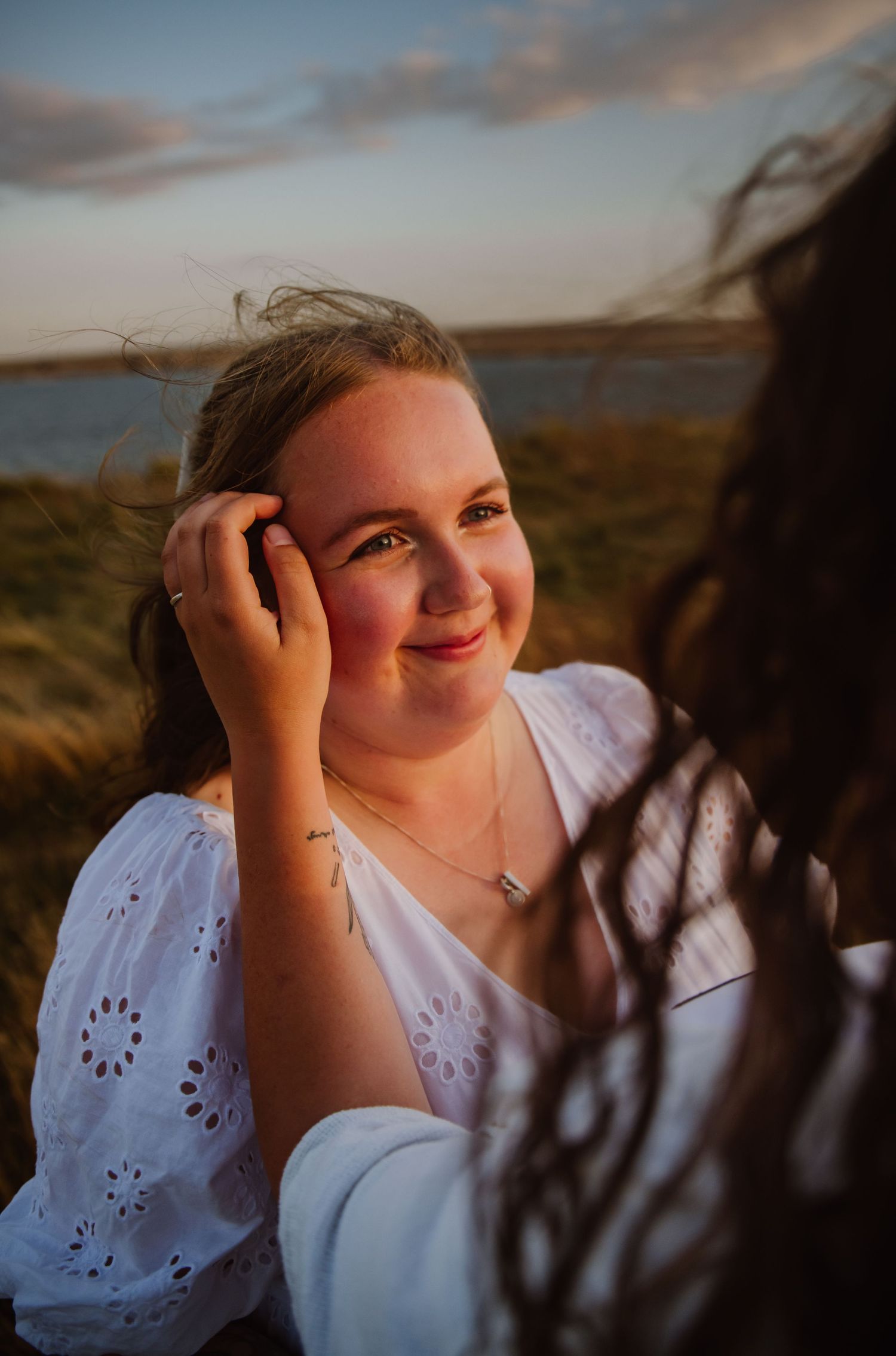 Chesil beach engagement shoot. Wedding photographer Weymouth. Dorset photographer. Dorset candid wedding photographer. Natural photos.