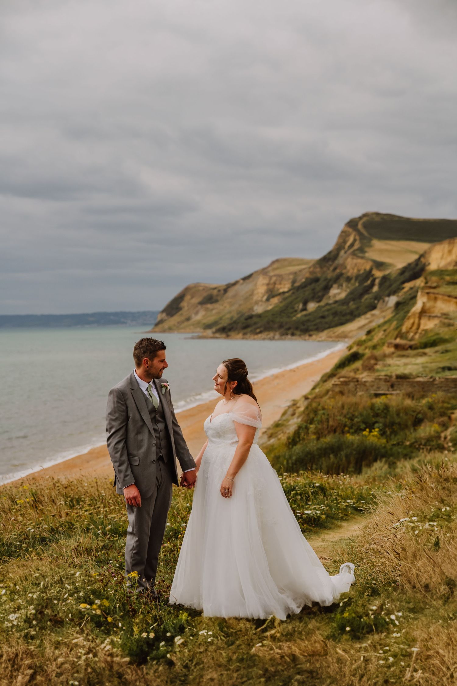 Wedding photos on beach cliff. Eype Bridport cliffs. Bridport wedding photographer. Bridport wedding venue. Bridport wedding.