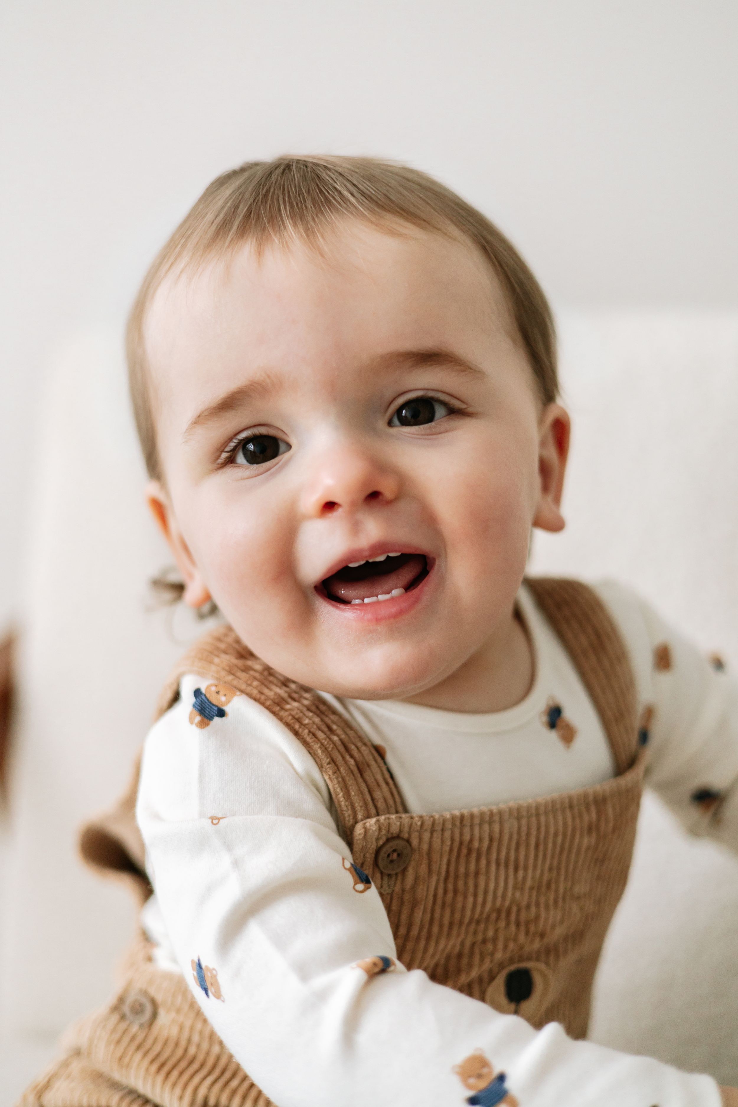 Adorable smiling baby birthday photoshoot Nottingham natural relaxed