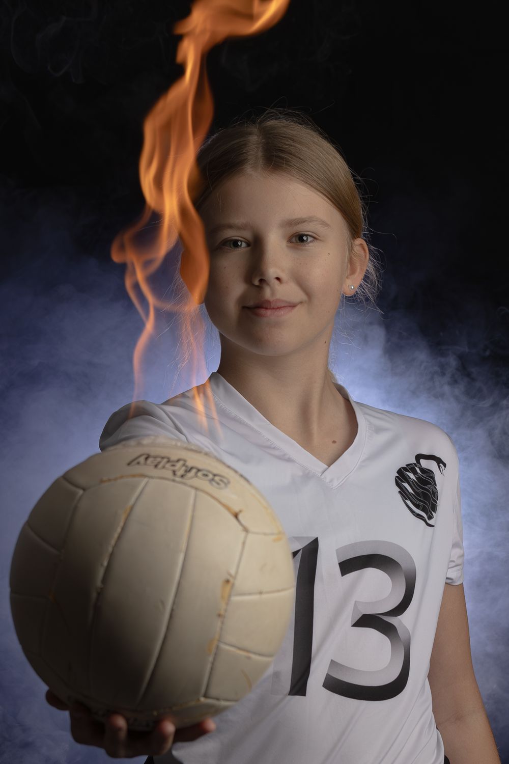 Girls volleyball player posing for portrait session