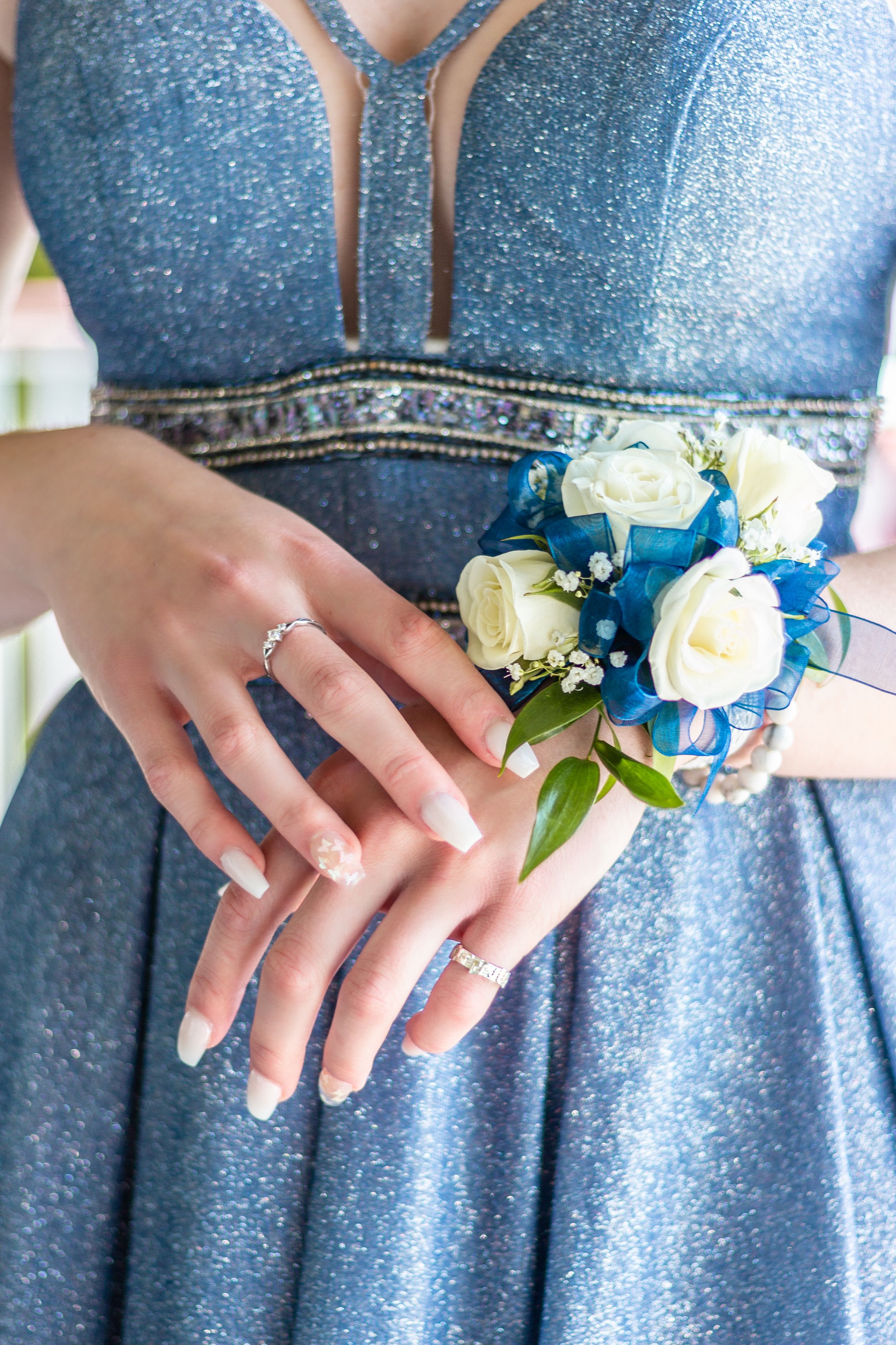Close-up detail photo of a sparkly blue prom dress by Nova Scotia portrait photographer Daneesha Williams