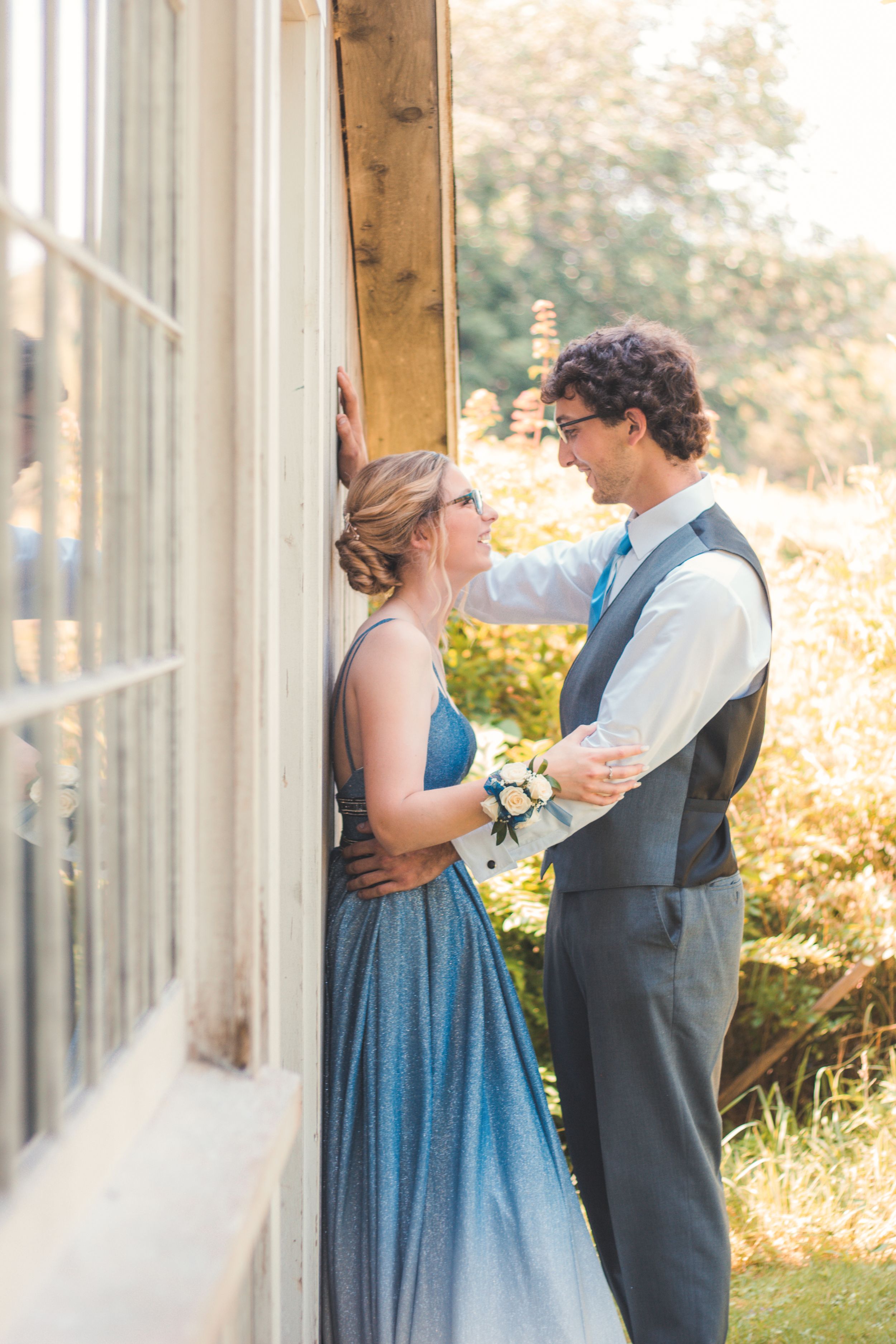 Natural light portrait of a prom couple taken outdoors by Daneesha Williams Photography