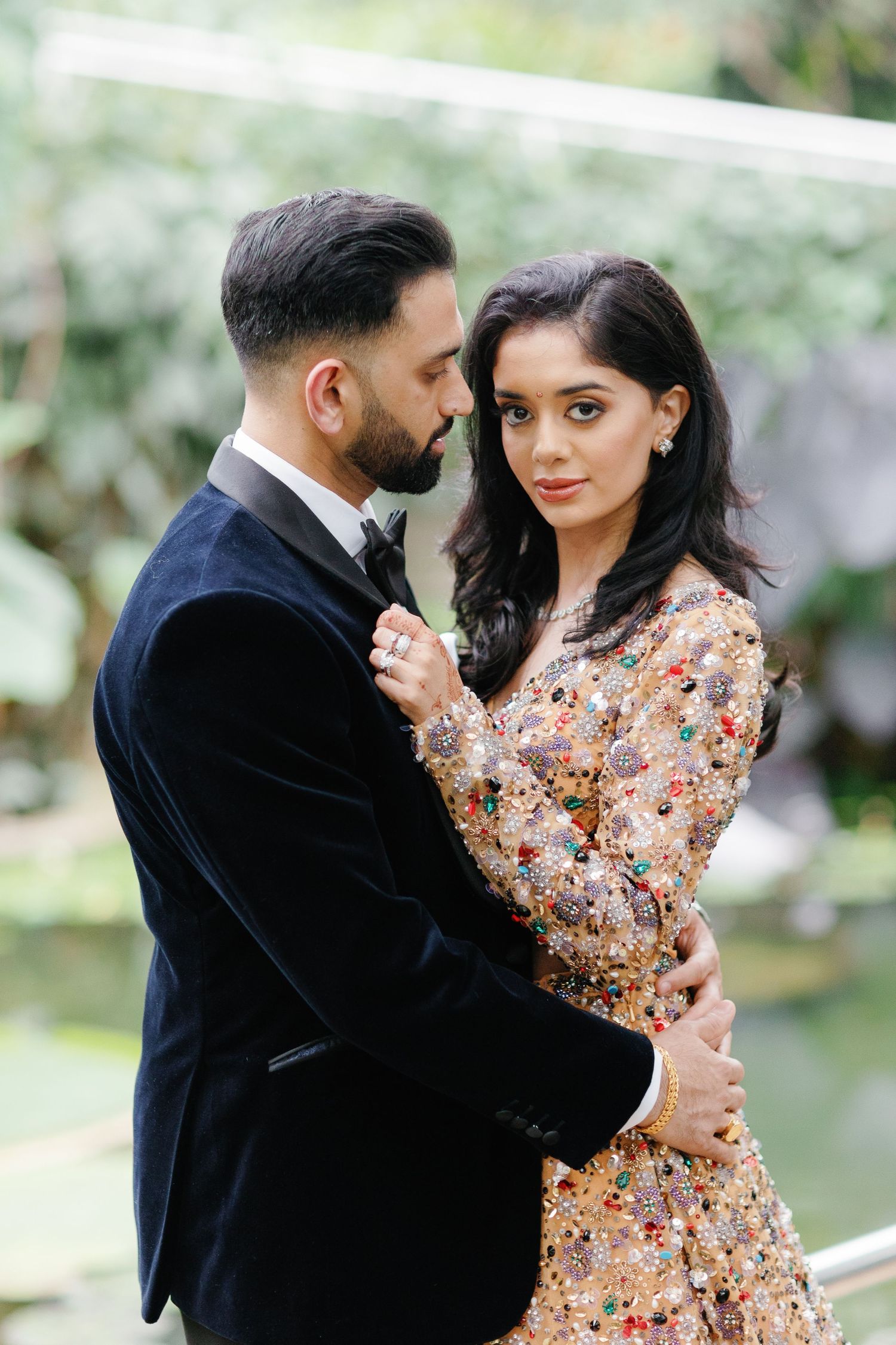 Fashionable Indian couple portrait at Princess of Wakes Conservatory at Kew Gardens