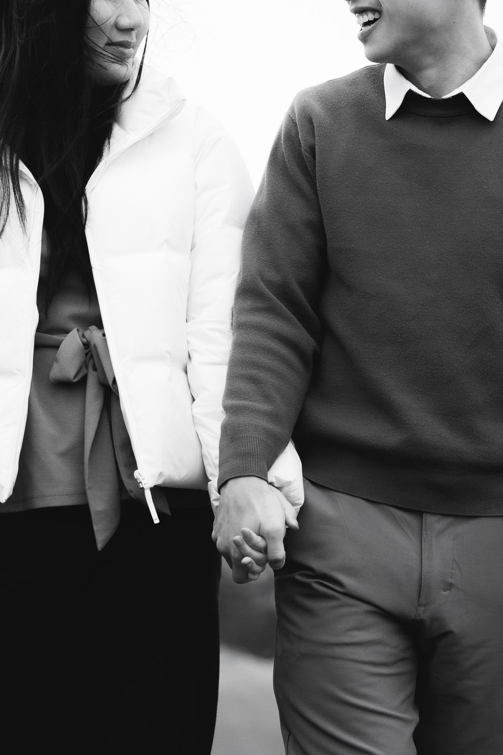 A black and white collage of people in formal attire holding hands and showing affection.
