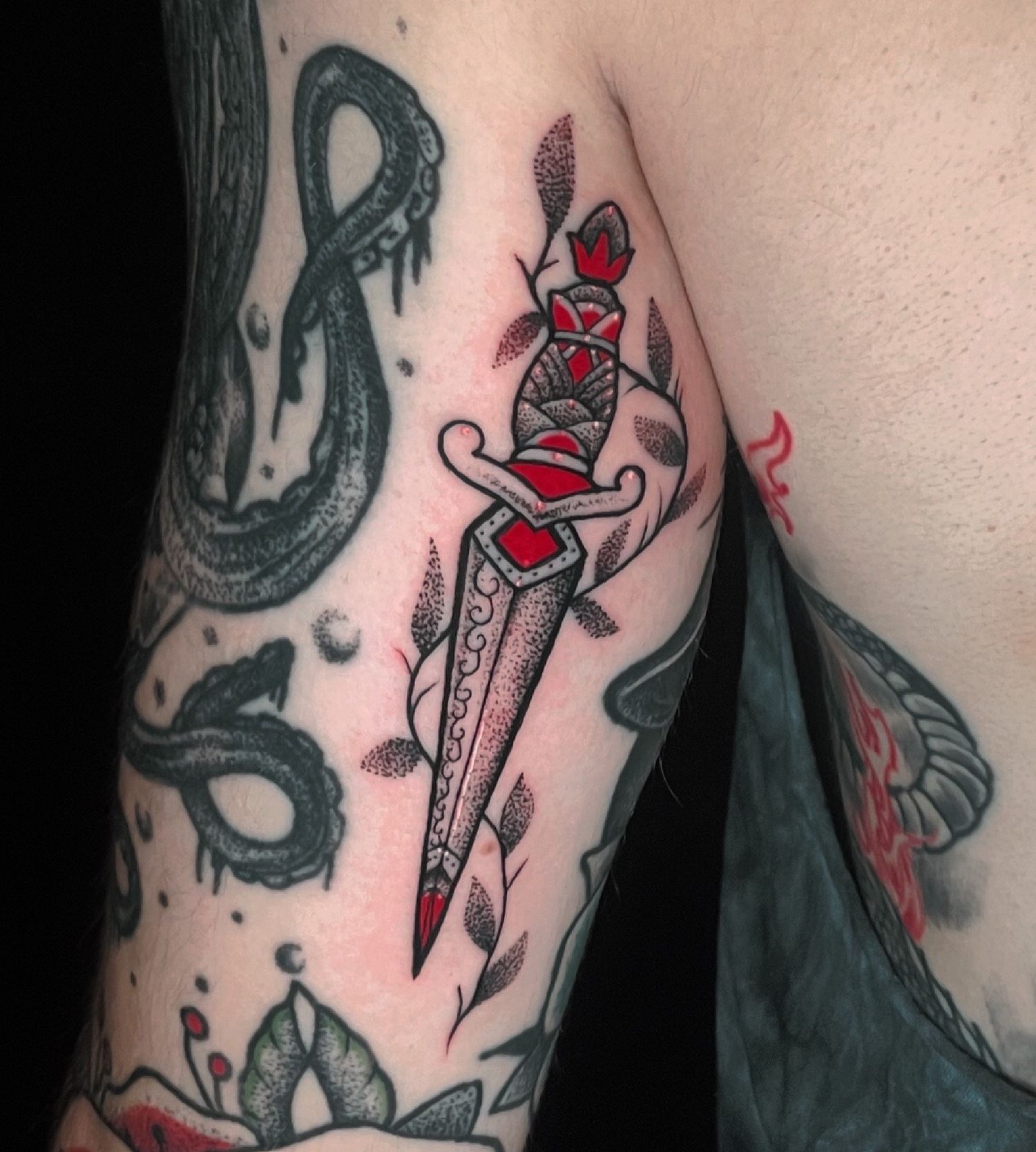 Dagger, mixing traditional and dotwork styles.