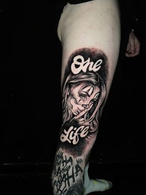 Chicano style woman face, black and grey.