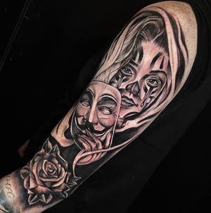 Chicano style, black and grey.