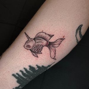 Unicorn fish, traditional style with dotwork shading.