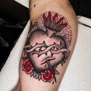 Traditional style sacred heart with dotwork shading.