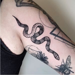 Traditional style snake with dotwork shading.