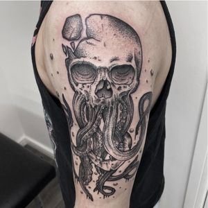 Traditional style skull octopus with dotwork shading.