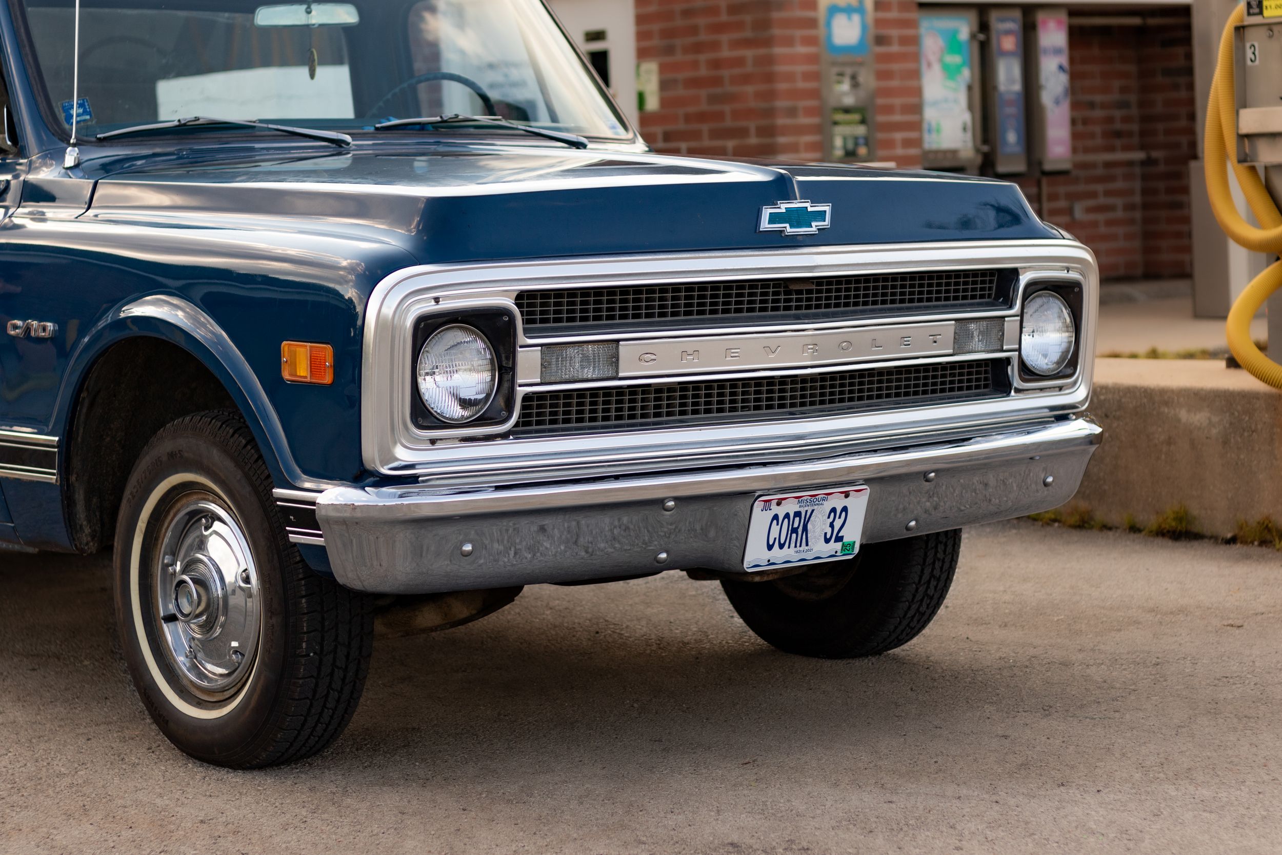 A collection of classic Chevrolet car front ends and grilles in blue tones.