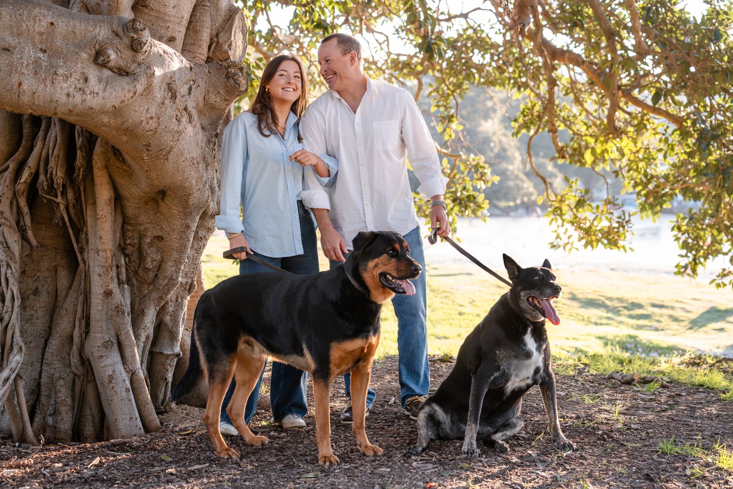 Dad and his daughter during a family photoshoot with dogs in Balmoral Beach