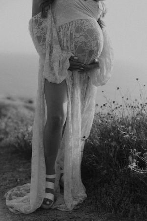 A collection of vintage black and white photos showing figures walking through a garden.