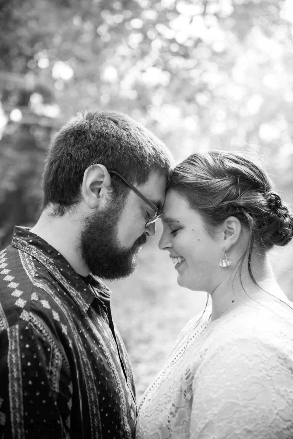 bride and groom touching forheads