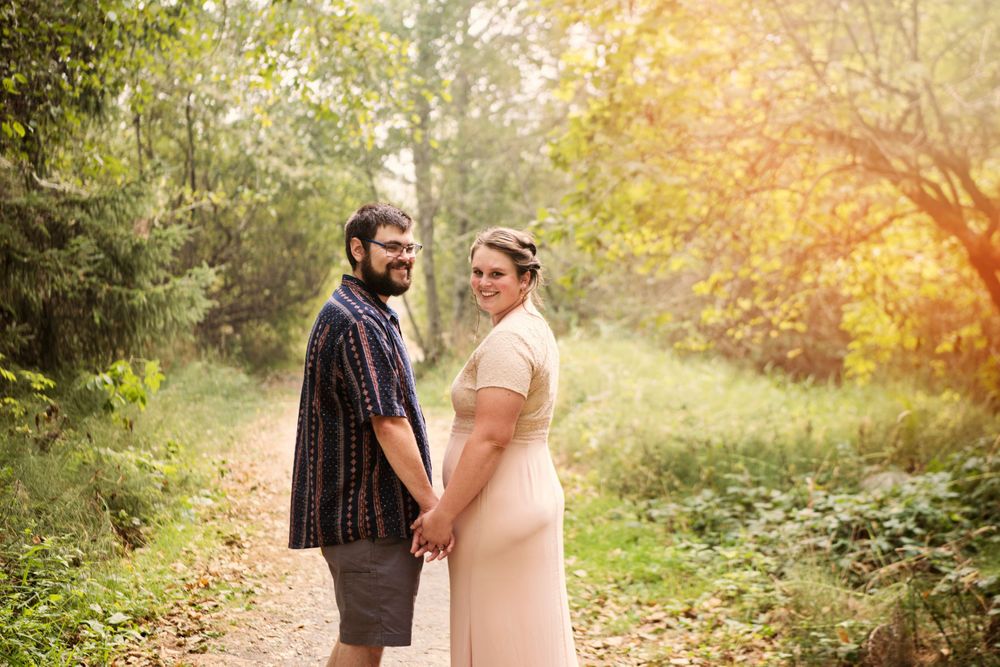 couple on their wedding day walking at Fort Clatsop State Park