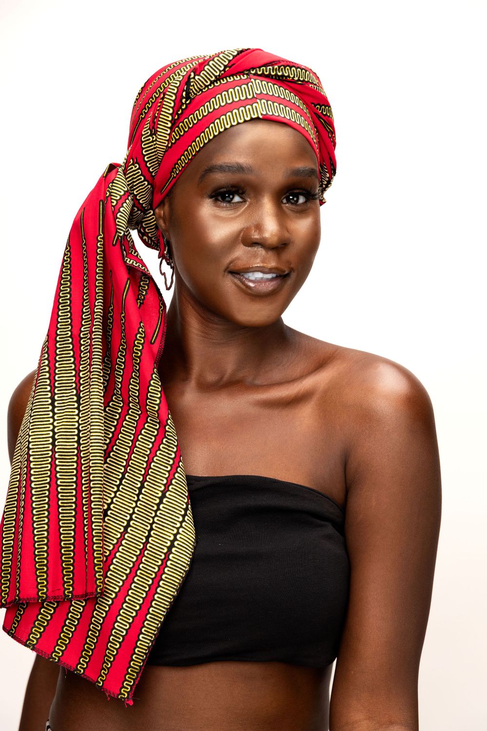 Portrait series showing red and gold headwrap styling against white background.