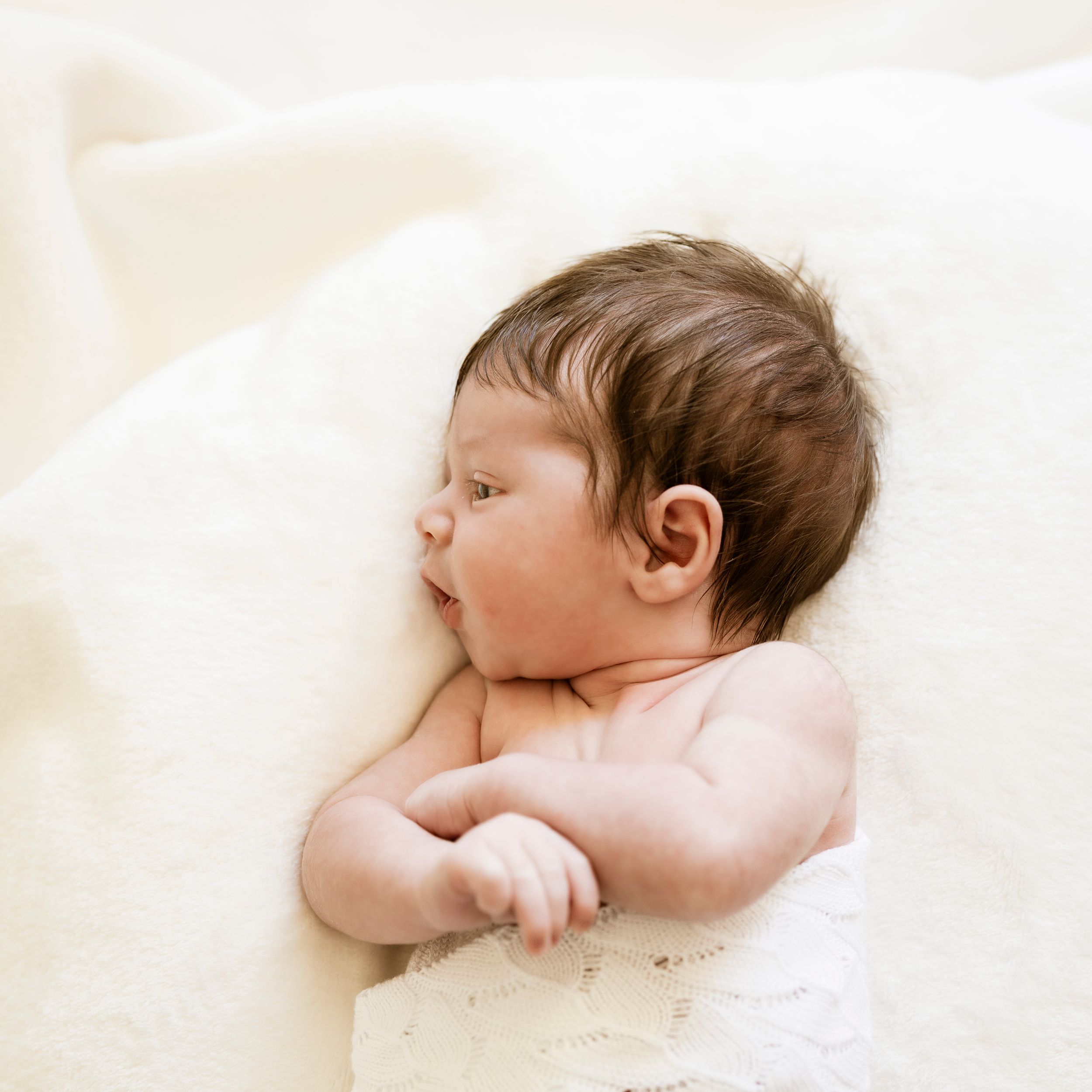 emotional in-home newborn shoot capturing early bonding moments in their Pymble home