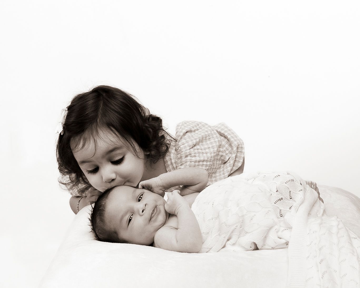 baby boy captured with his toddler sister in St Ives