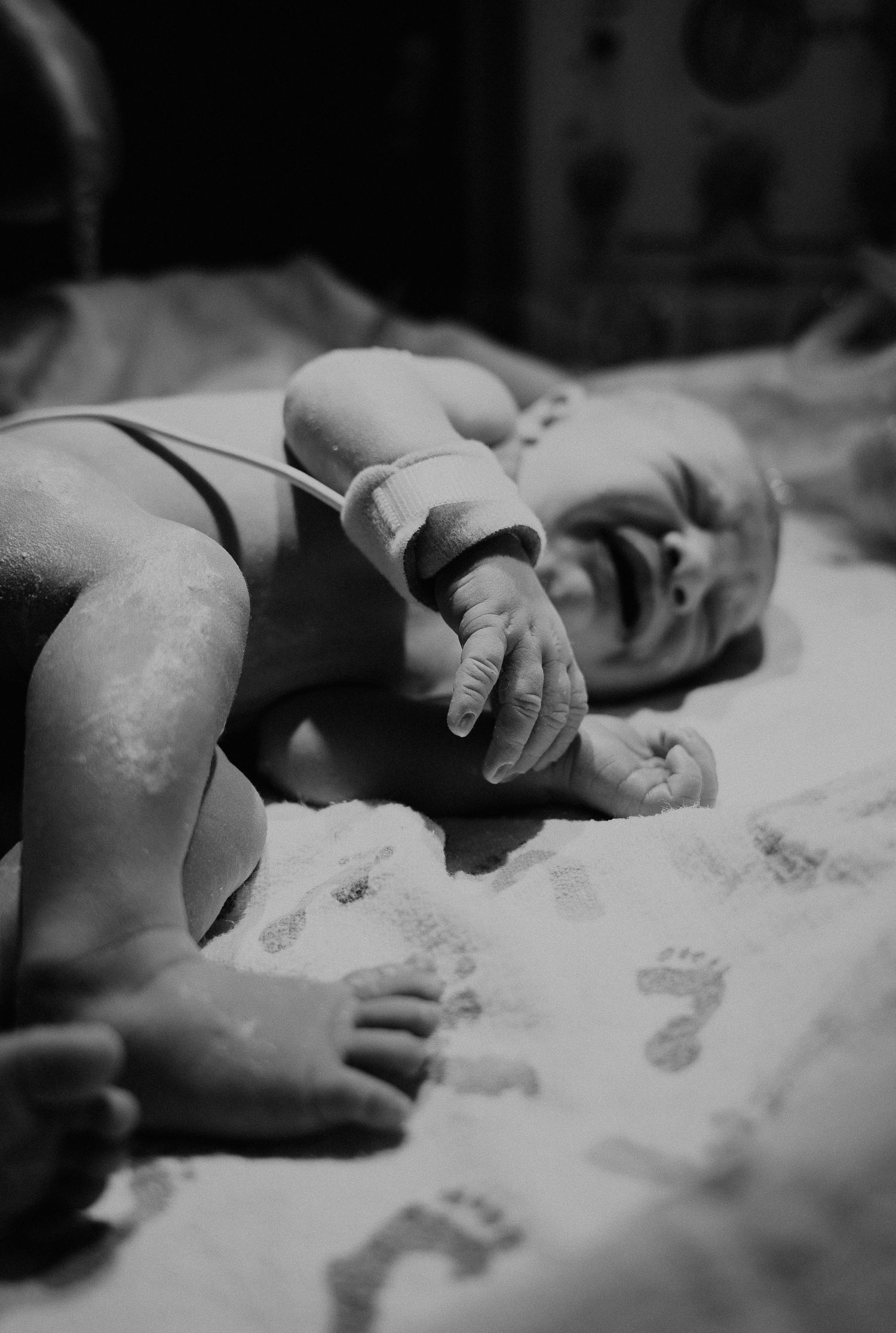 newborn baby boy at Presbyterian dallas. black and white newborn photo of baby boy in hospital.