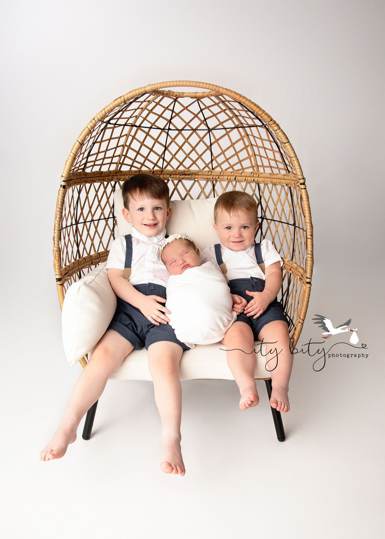 Two Toddlers loving on their new baby sister | Newborn Baby Photography Session | Avon Lake Ohio