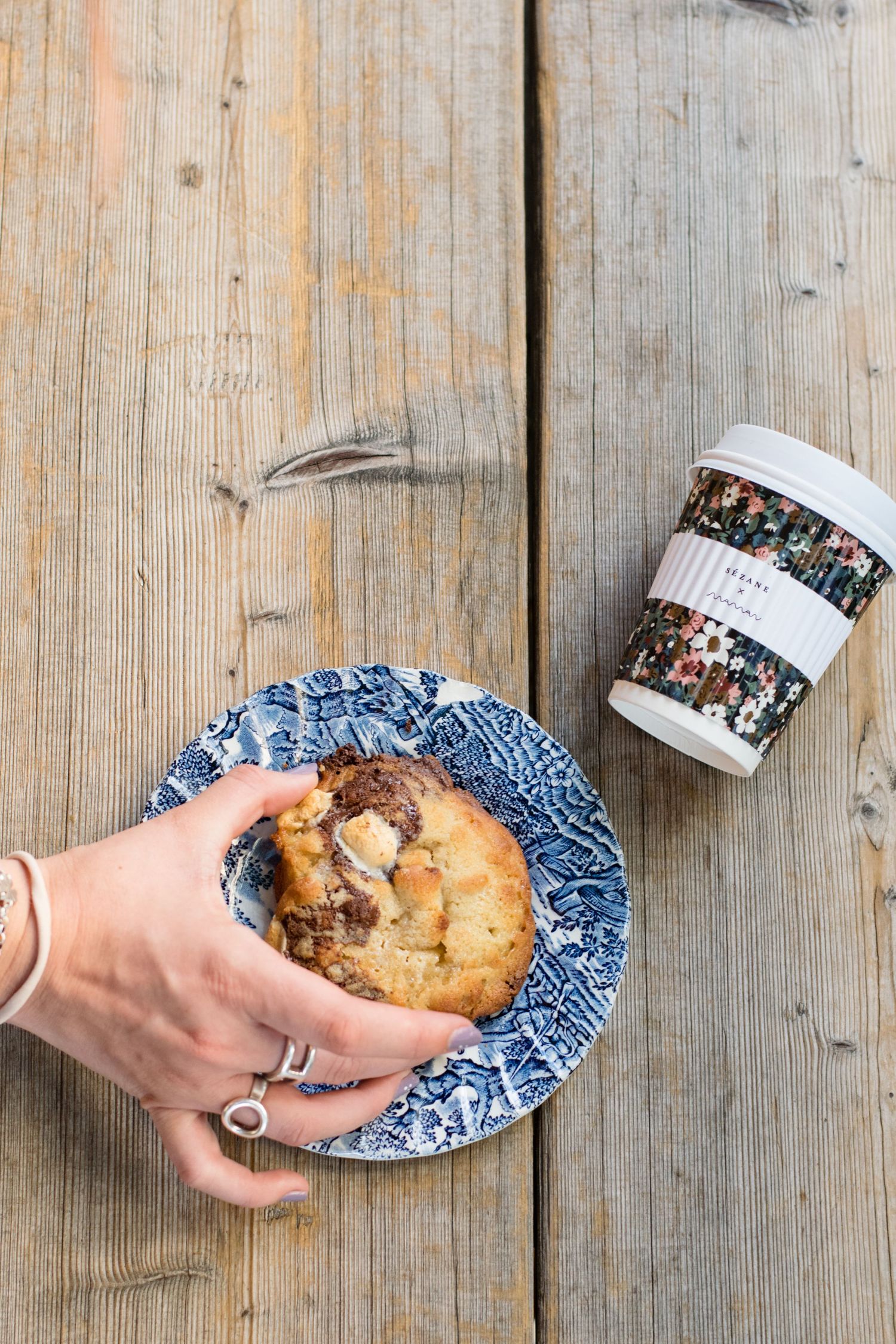 coffee cup with chocolate chip cookie