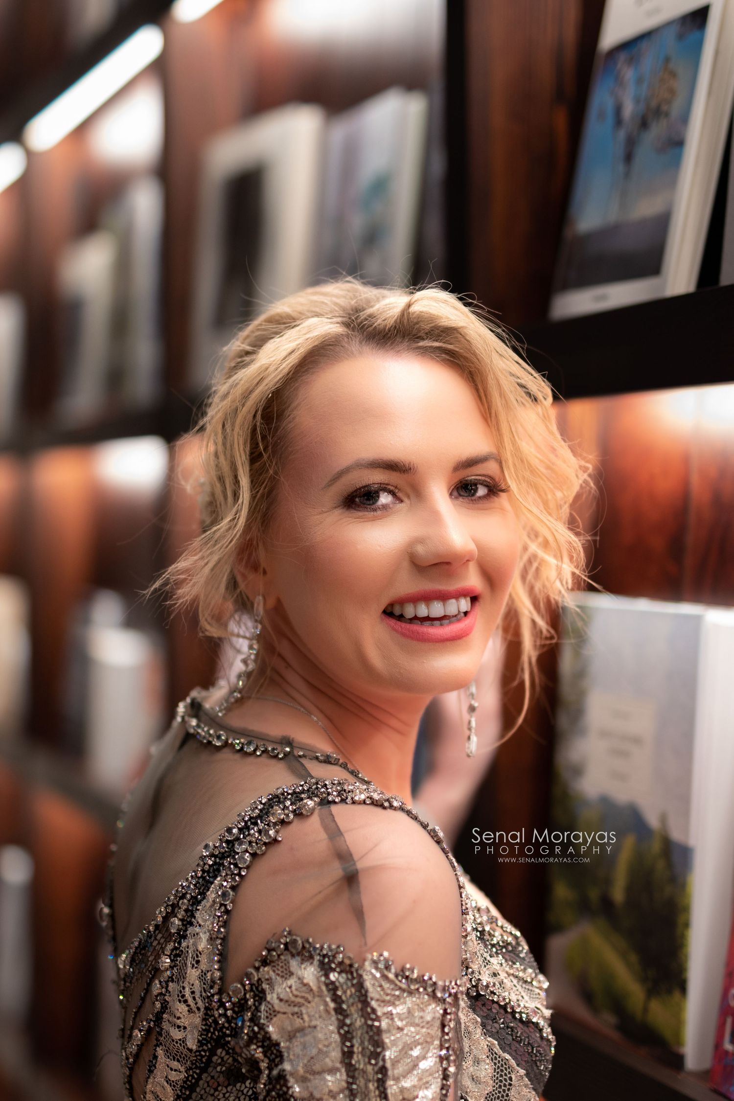 Artistic portrait series in an elegant indoor setting with dramatic lighting.