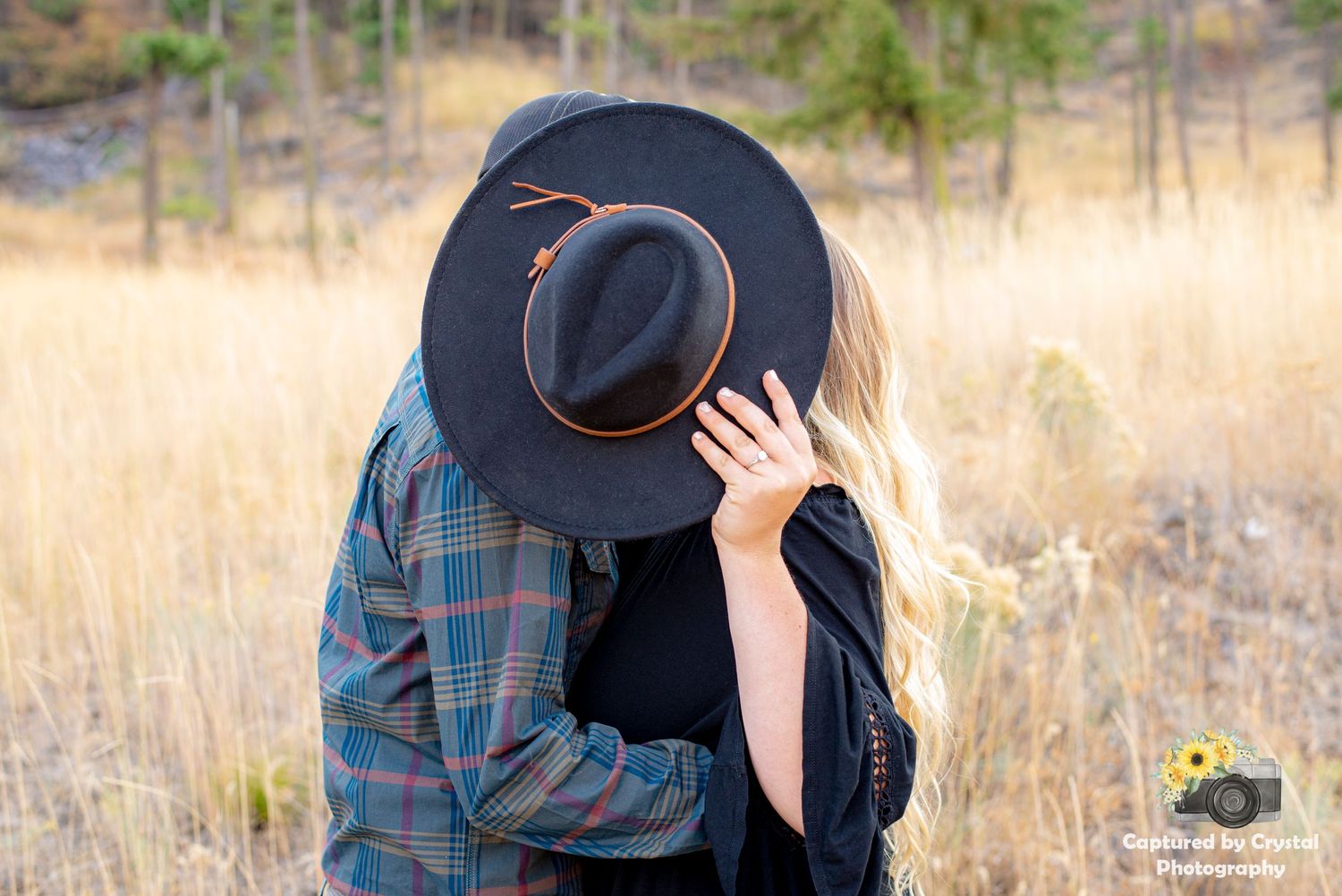 An engaged couple pose for their engagement photoshoot in Ellensburg, Washington.