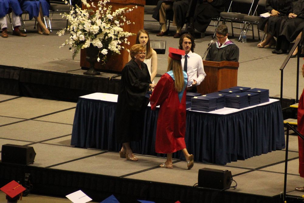 graduation, cap and gown, senior year, stage, walking