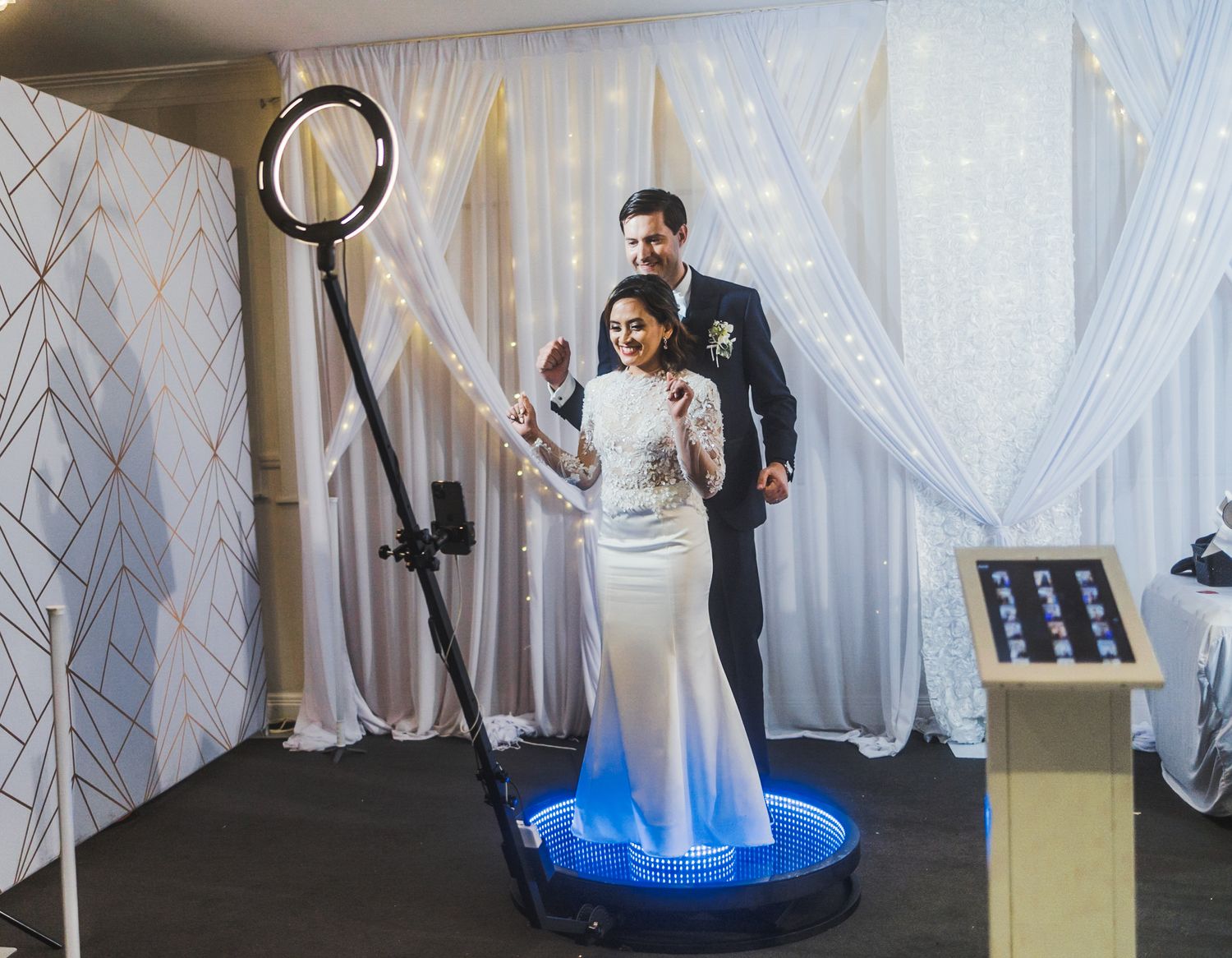 Wedding Couple using 360 booth during their reception at Allely Estate