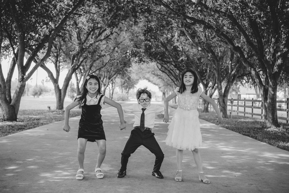black and white. silly kids posing. family photo session. azenda events. Edinburg, Texas. Wedding photographer.