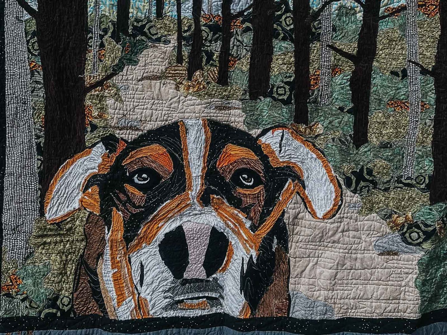 Art quilt of Kilei the dog.