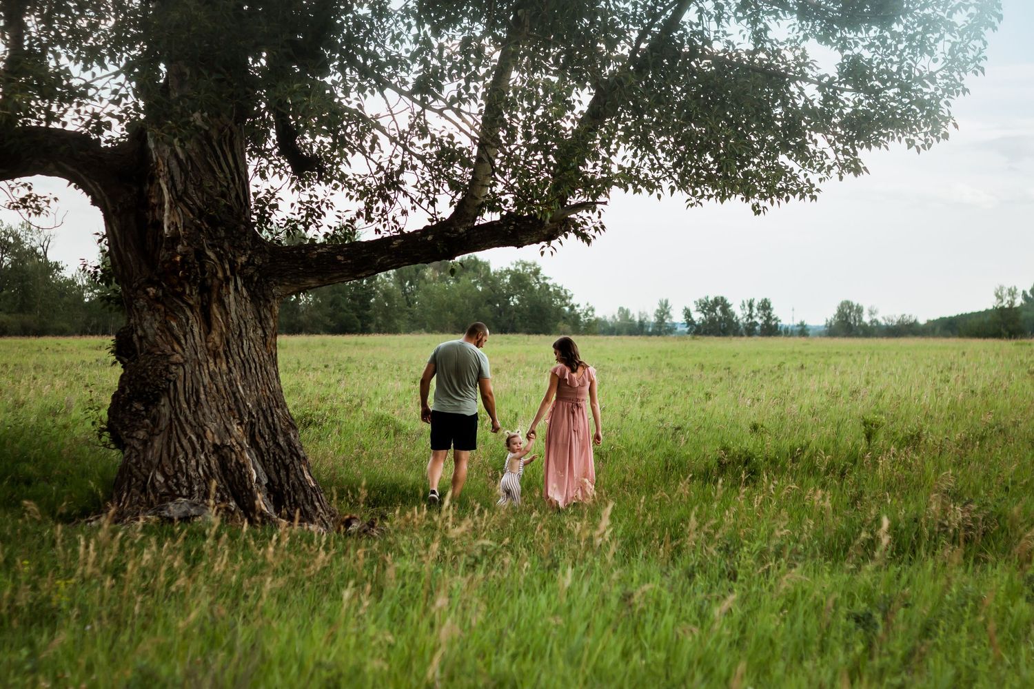 Beautiful summer family photos in pinks & greens in Calgary Alberta by Love & Sunshine Photography.