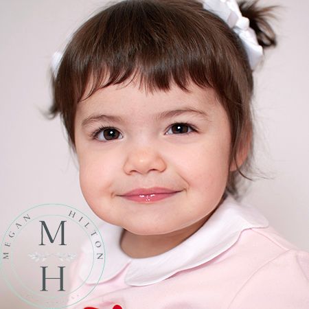Smiling close up of toddler girl photo