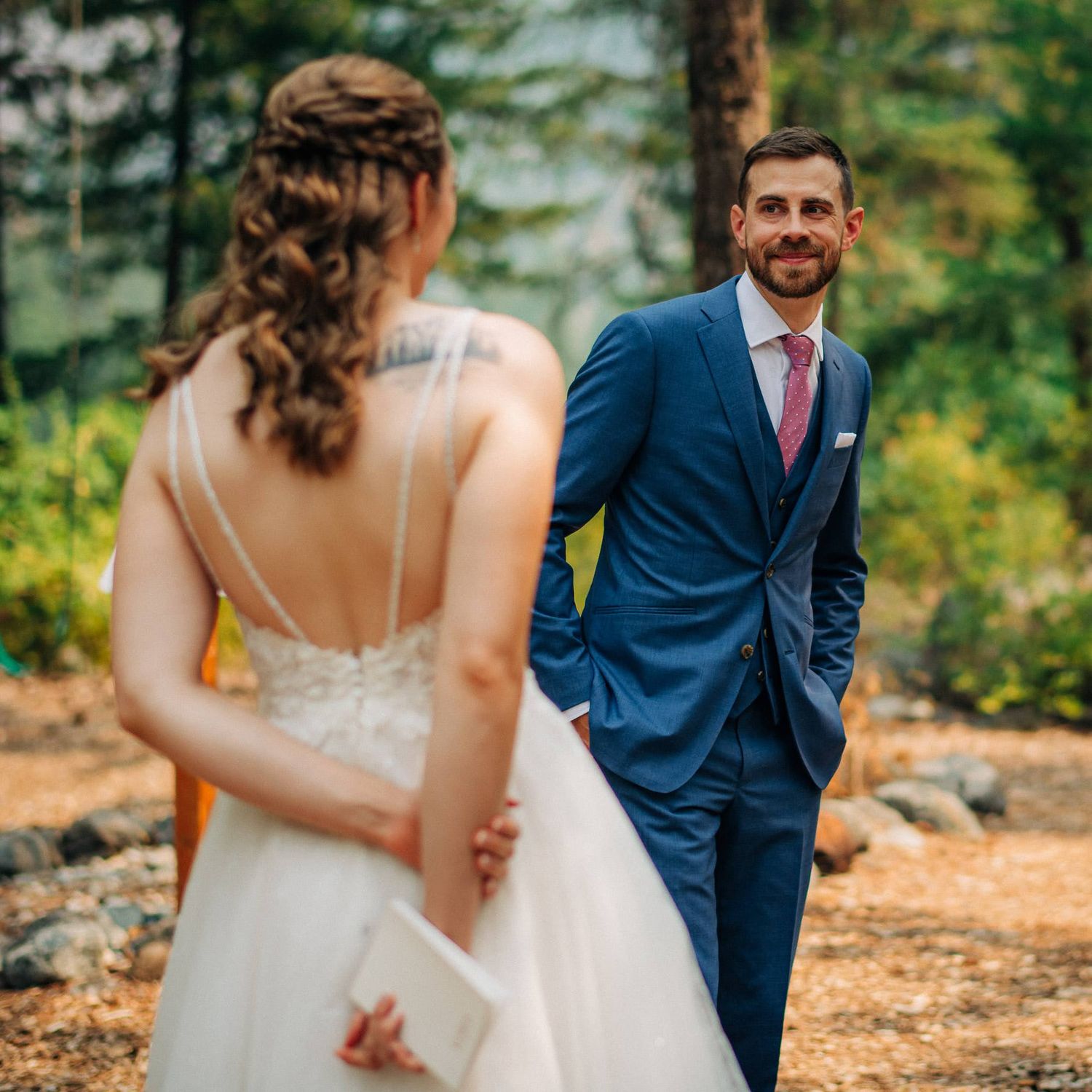 Groom's smile during first look in outdoor Leavenworth, WA