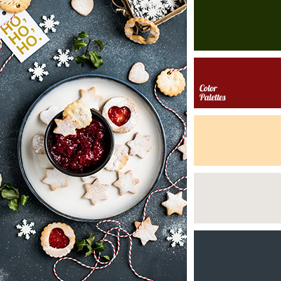 Christmas dessert plate with dark red jam and star-shaped cookies on dark background with snowflake decorations.