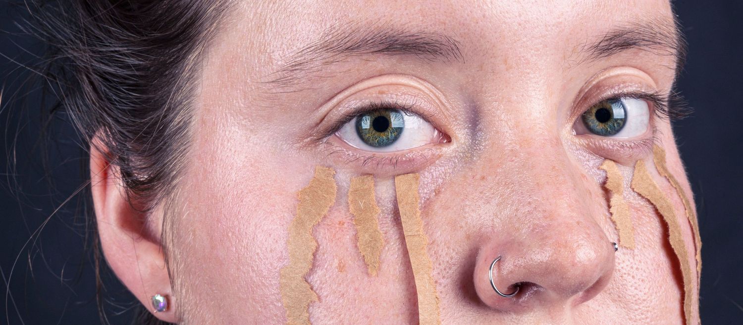 Detailed macro photography of eyes and facial features with metallic accents.