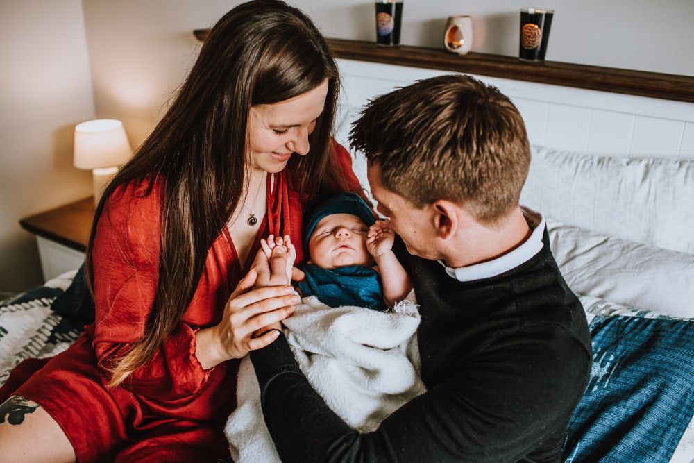 Newborn family photoshoot. Newborn baby boy.