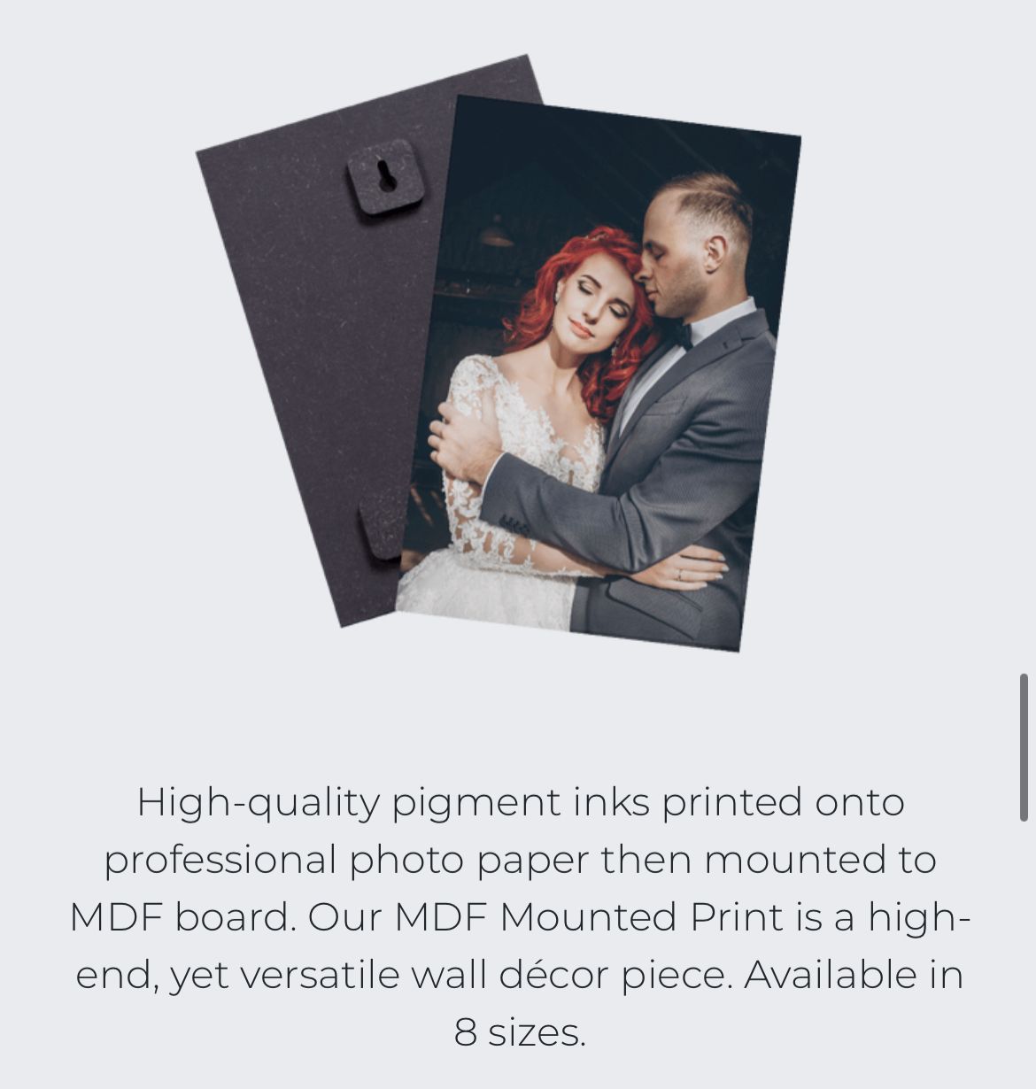 Professional photo print mounted on dark MDF board showing elegant couple.