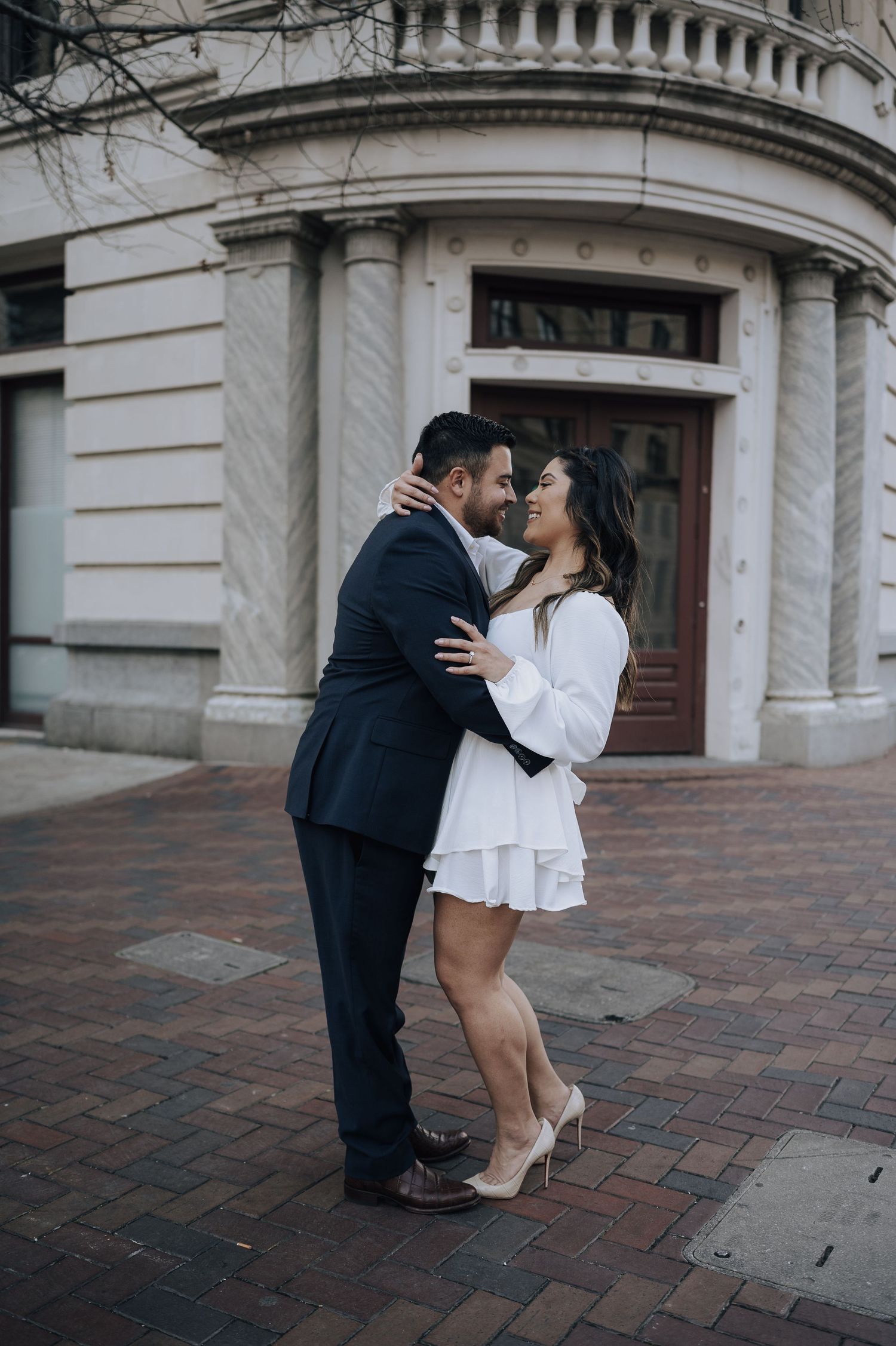 Houston area couple's engagement session. He is kissing her and dipping her backwards.