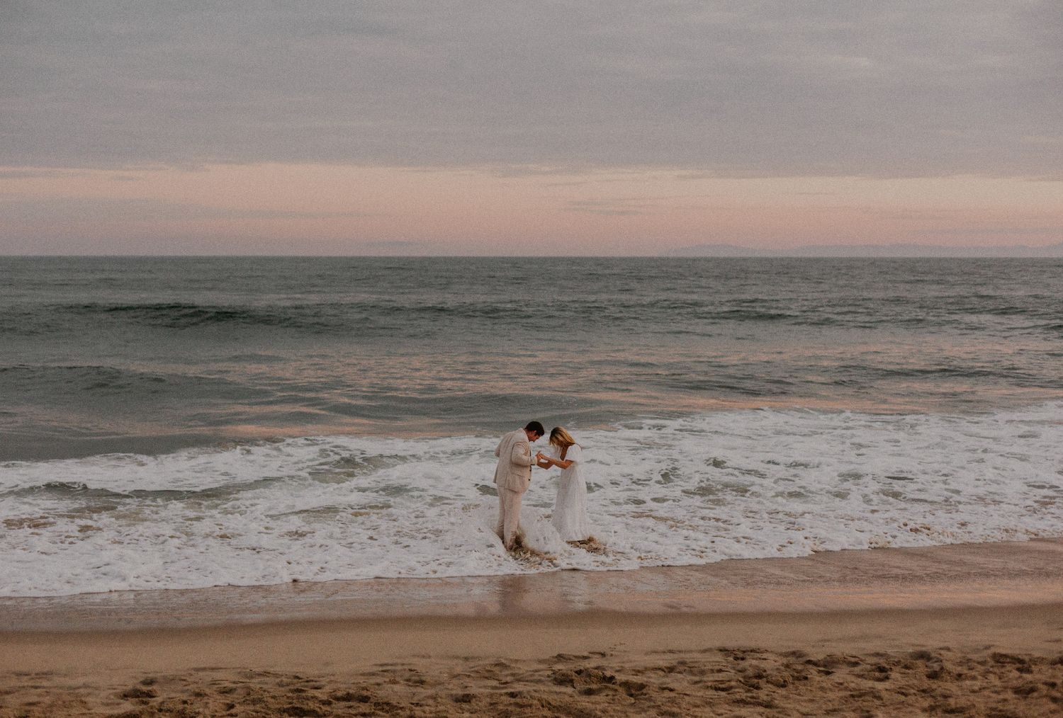 Newport beach sunset couple's engagement shoot during blue hour