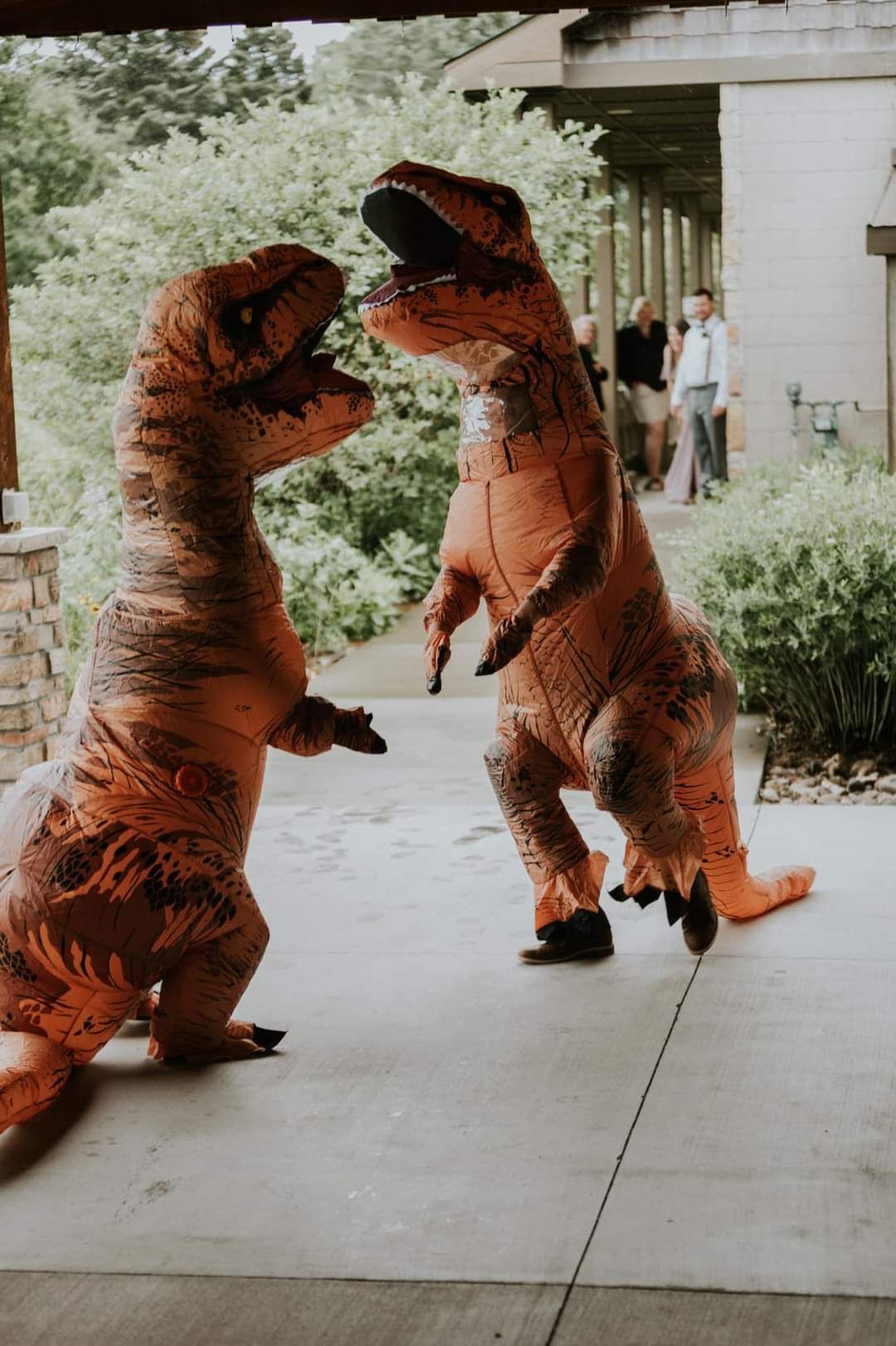 Dancing in dinosaur suites