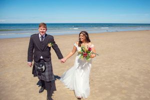 bride and groom on the beach