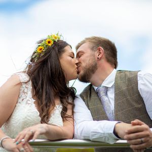 wedding couple sharing a kiss