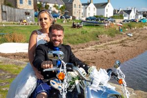 wedding couple on a motorbike