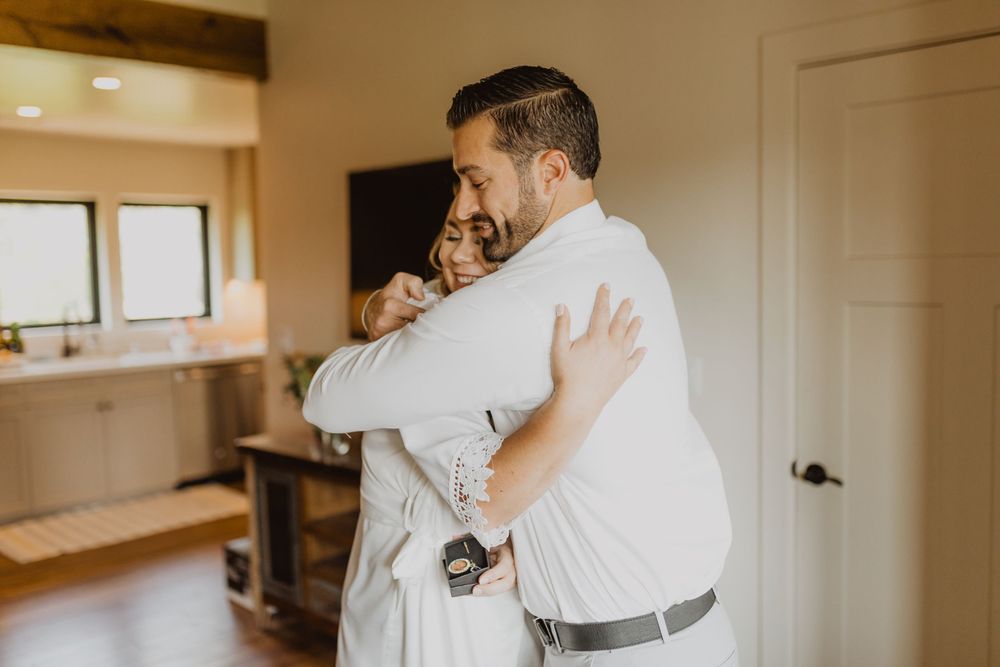 Wedding preparation moments captured in a warm-toned room with natural light.